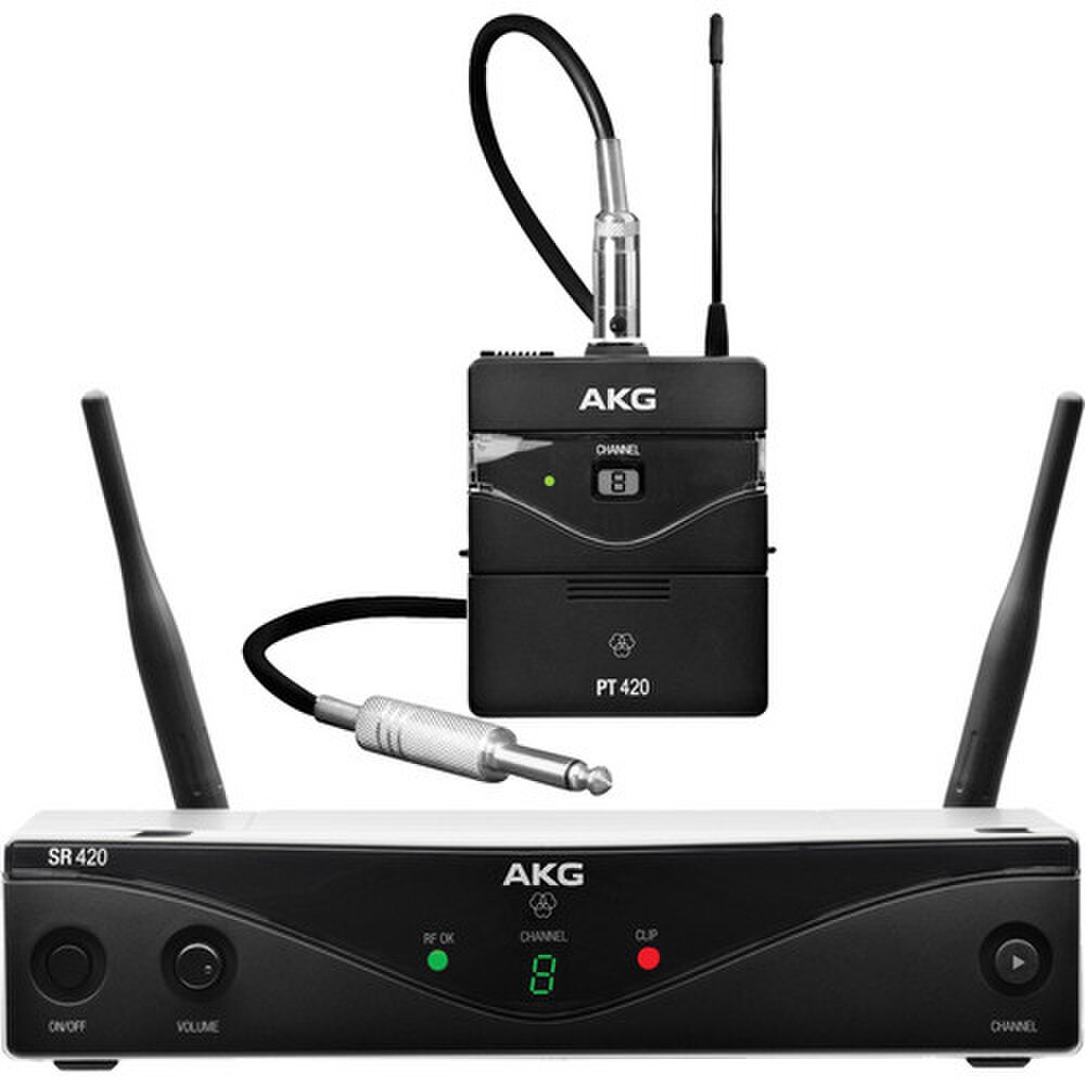 A photo of an AKG WMS420 Wireless Microphone System with a handheld transmitter, a bodypack transmitter, and a stationary receiver